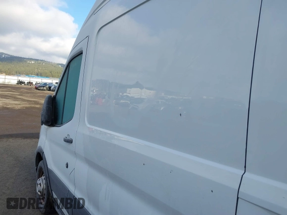 2020 Ford Transit Cargo with VIN 1FTBR3U83LKA32806, listed as a IAAI auction lot 41364870 with 173,822 mi miles and . Bid and sale history available at DreamBid. Image 6.