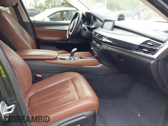 2015 BMW X6 xDrive35i z VIN 5UXKU2C59F0N76242, wystawiony jako IAAI lot #41714644 z przebiegiem 170 851 mil mil oraz . Historia ofert i sprzedaży dostępna na DreamBid. Obrazek 5.