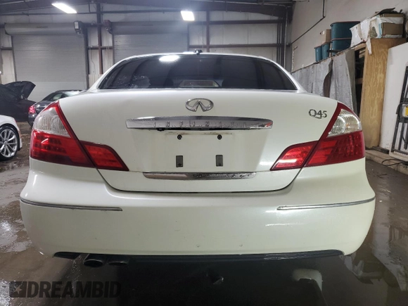 2005 Infiniti Q45 z VIN JNKBF01A55M101676, wystawiony jako Copart lot #44019275 z przebiegiem 157 254 mil mil oraz Szkody całkowita. Historia ofert i sprzedaży dostępna na DreamBid. Obrazek 6.