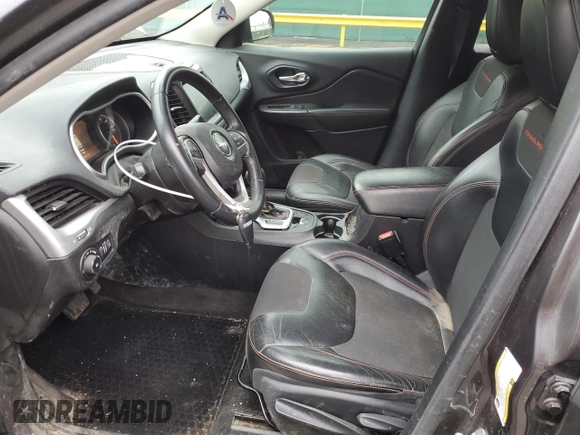 2016 Jeep Cherokee Trailhawk with VIN 1C4PJMBB0GW164437, listed as a Copart auction lot 54776985 with 158,801 mi miles and Salvage title. Bid and sale history available at DreamBid. Image 7.