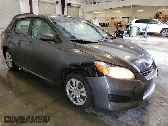 2009 Toyota Matrix S with VIN 2T1LE40E79C011596, listed as a Copart auction lot 60873695 with 207,692 mi miles and Salvage title. Bid and sale history available at DreamBid. Image 4.
