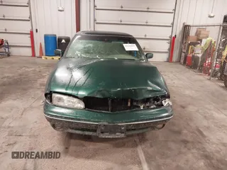 1997 Pontiac Bonneville SE z VIN 1G2HX52KXVH250272, wystawiony jako IAAI lot #41644041 z przebiegiem 160 791 mil mil oraz . Historia ofert i sprzedaży dostępna na DreamBid. Obrazek 13.