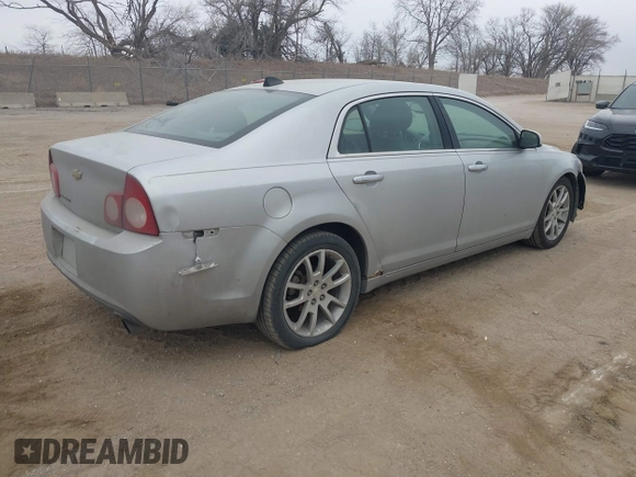 2012 Chevrolet Malibu LTZ with VIN 1G1ZG5E79CF264351, listed as a IAAI auction lot 41465508 with 213,854 mi miles and . Bid and sale history available at DreamBid. Image 4.