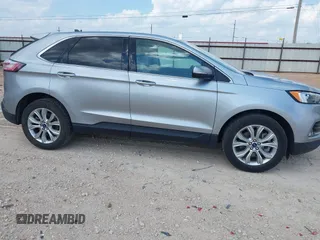 2022 Ford Edge Titanium with VIN 2FMPK4K99NBB06136, listed as a IAAI auction lot 42733977 with 57,794 mi miles and . Bid and sale history available at DreamBid. Image 13.