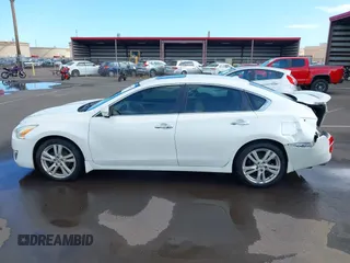 2013 Nissan Altima SL z VIN 1N4BL3AP6DC277579, wystawiony jako IAAI lot #42150029 z przebiegiem 257 273 mil mil oraz . Historia ofert i sprzedaży dostępna na DreamBid. Obrazek 14.