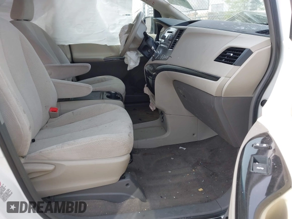 2014 Toyota Sienna LE AAS with VIN 5TDKK3DC0ES439163, listed as a IAAI auction lot 42155274 with Not provided miles and . Bid and sale history available at DreamBid. Image 5.