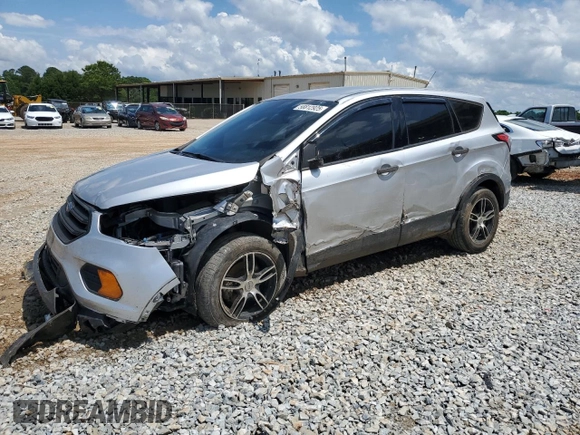 2018 Ford Escape S with VIN 1FMCU0F78JUB79464, listed as a Copart auction lot 58812925 with 104,642 mi miles and Salvage title. Bid and sale history available at DreamBid. Image 1.