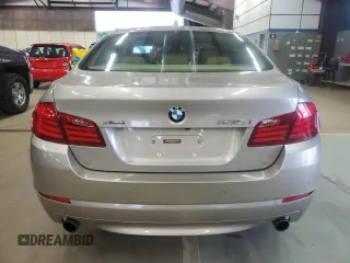 2013 BMW 5 Series 535i xDrive with VIN WBAFU7C57DDU74909, listed as a Copart auction lot 64053715 with 115,521 mi miles and Clean title. Bid and sale history available at DreamBid. Image 6.
