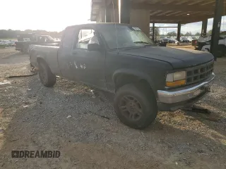 1995 Dodge Dakota z VIN 1B7GG23Y1SS183049, wystawiony jako Copart lot #72961204 z przebiegiem 406 345 mil mil oraz Czysty tytuł • Clean title. Historia ofert i sprzedaży dostępna na DreamBid. Obrazek 4.