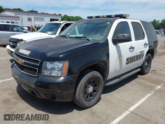 2013 Chevrolet Tahoe Commercial z VIN 1GNLC2E00DR337995, wystawiony jako IAAI lot #42213635 z przebiegiem Nie podano mil oraz . Historia ofert i sprzedaży dostępna na DreamBid. Obrazek 2.