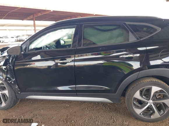 2017 Hyundai Tucson Value with VIN KM8J33A22HU316495, listed as a IAAI auction lot 41896507 with 82,517 mi miles. Bid and sale history available at carsss.com. Image 14.