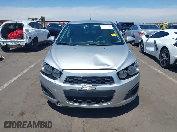 2014 Chevrolet Sonic LS with VIN 1G1JA6SH1E4135729, listed as a IAAI auction lot 42169273 with 74,969 mi miles and . Bid and sale history available at DreamBid. Image 12.