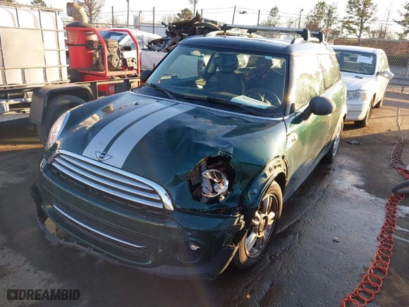 2013 MINI Cooper Clubman with VIN WMWZF3C57DT489934, listed as a IAAI auction lot 41290072 with 109,337 mi miles. Bid and sale history available at carsss.com. Image 2.