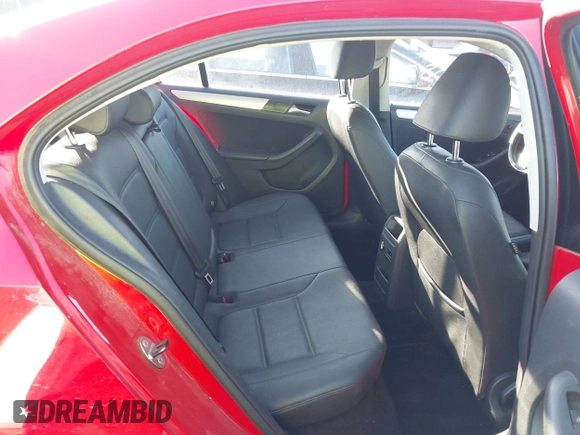 2012 Volkswagen Jetta TDI w/Premium z VIN 3VWLL7AJ3CM027986, wystawiony jako IAAI lot #41453897 z przebiegiem 68 928 mil mil oraz . Historia ofert i sprzedaży dostępna na DreamBid. Obrazek 8.