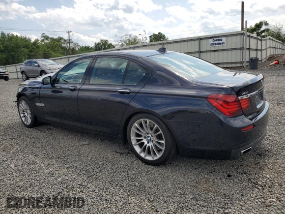 2015 BMW 7 Series 750i xDrive with VIN WBAYB6C58FD966084, listed as a Copart auction lot 61875325 with 159,616 mi miles and Salvage title. Bid and sale history available at DreamBid. Image 2.