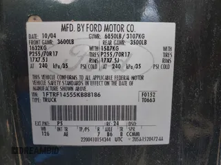 2005 Ford F-150 XL with VIN 1FTRF14555KB88186, listed as a IAAI auction lot 41815601 with 195,049 mi miles. Bid and sale history available at carsss.com. Image 9.