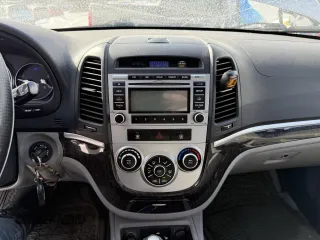 2009 Hyundai Santa Fe GL with VIN 5NMSG73E59H293640, listed as a Copart auction lot 52314035 with 157,367 mi miles and Salvage title. Bid and sale history available at DreamBid. Image 8.