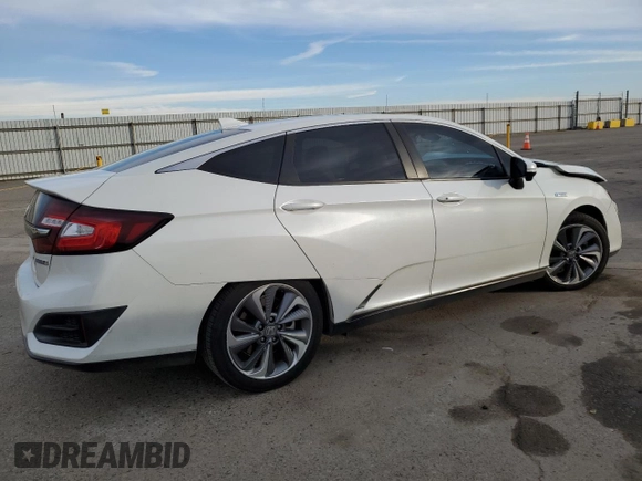 2018 Honda Clarity with VIN JHMZC5F16JC010090, listed as a Copart auction lot 86770354 with 119,399 mi miles and Salvage Title. Bid and sale history available at DreamBid. Image 3.