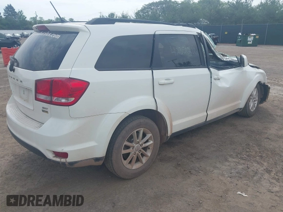 2017 Dodge Journey SXT z VIN 3C4PDCBG8HT534473, wystawiony jako IAAI lot #42351286 z przebiegiem 127 917 mil mil oraz . Historia ofert i sprzedaży dostępna na DreamBid. Obrazek 4.