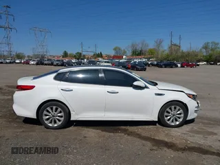 2016 Kia Optima EX z VIN 5XXGU4L37GG048085, wystawiony jako IAAI lot #42044849 z przebiegiem 107 304 mil mil oraz . Historia ofert i sprzedaży dostępna na DreamBid. Obrazek 13.