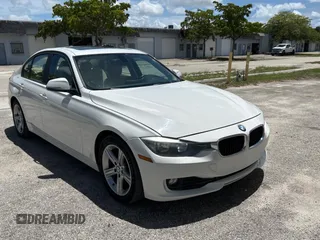 2013 BMW 3 Series 328i with VIN WBA3A5G52DNP19023, listed as a Copart auction lot 64636585 with 153,422 mi miles and Salvage title. Bid and sale history available at DreamBid. Image 1.