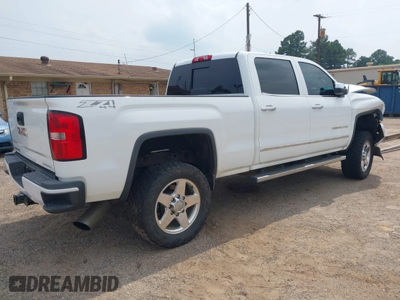 2015 GMC Sierra 2500HD Denali z VIN 1GT120E89FF190917, wystawiony jako IAAI lot #42271537 z przebiegiem 149 307 mil mil oraz . Historia ofert i sprzedaży dostępna na DreamBid. Obrazek 4.