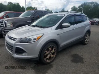 2013 Ford Escape Titanium with VIN 1FMCU9J90DUB31927, listed as a Copart auction lot 63701025 with 205,843 mi miles and Clean title. Bid and sale history available at DreamBid. Image 1.