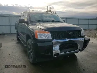 2015 Nissan Titan SV z VIN 1N6BA0EC0FN503240, wystawiony jako Copart lot #72539284 z przebiegiem 149 416 mil mil oraz Szkoda całkowita • Salvage title. Historia ofert i sprzedaży dostępna na DreamBid. Obrazek 11.