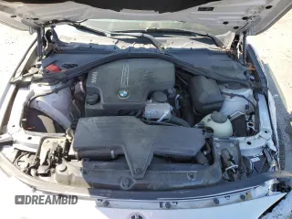2014 BMW 4 Series 428i xDrive with VIN WBA3N5C51EF716572, listed as a Copart auction lot 52086365 with 209,742 mi miles and Salvage Title. Bid and sale history available at DreamBid. Image 12.