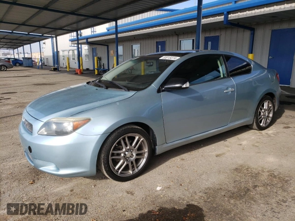 2007 Scion tC Spec with VIN JTKDE177570202301, listed as a Copart auction lot 83015074 with 184,108 mi miles and Salvage Title. Bid and sale history available at carsss.com. Image 1.