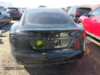 2014 Tesla Model S 60 with VIN 5YJSA1H1XEFP34226, listed as a IAAI auction lot 41806604 with 216,021 mi miles and . Bid and sale history available at DreamBid. Image 16.