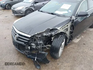 2014 Cadillac ATS Standard RWD with VIN 1G6AA5RX5E0104427, listed as a IAAI auction lot 41542467 with 83,351 mi miles and . Bid and sale history available at DreamBid. Image 6.