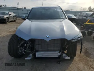 2025 BMW X5 xDrive40i with VIN 5UX23EU01S9Z44555, listed as a Copart auction lot 48656295 with 90 mi miles and Salvage Title. Bid and sale history available at carsss.com. Image 5.