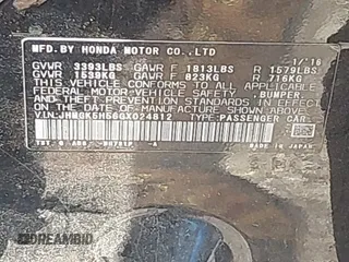 2016 Honda Fit LX with VIN JHMGK5H56GX024812, listed as a IAAI auction lot 42533539 with 110,304 mi miles and . Bid and sale history available at DreamBid. Image 9.