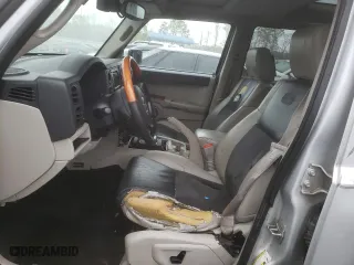 2007 Jeep Commander Overland with VIN 1J8HH68287C691543, listed as a Copart auction lot 50884205 with 225,244 mi miles and Salvage Title. Bid and sale history available at carsss.com. Image 7.