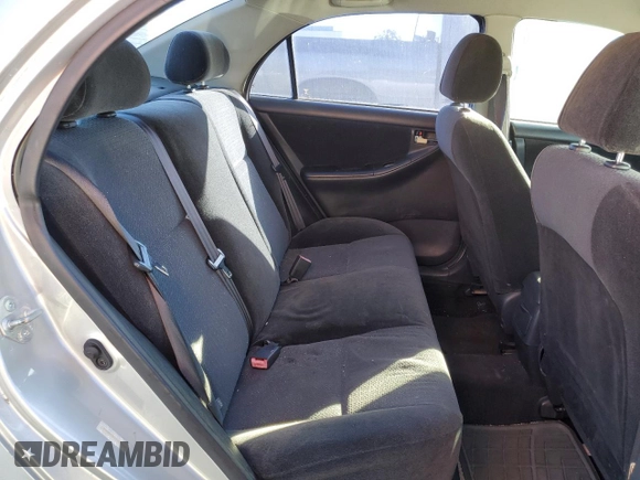 2003 Toyota Corolla CE with VIN 1NXBR32E13Z155142, listed as a Copart auction lot 79714184 with 299,999 mi miles and Salvage Title. Bid and sale history available at DreamBid. Image 10.