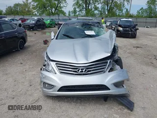 2013 Hyundai Azera z VIN KMHFH4JG5DA225239, wystawiony jako IAAI lot #42166107 z przebiegiem 118 350 mil mil oraz . Historia ofert i sprzedaży dostępna na DreamBid. Obrazek 6.