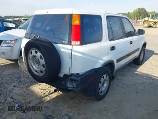 2000 Honda CR-V LX with VIN JHLRD2844YC011658, listed as a IAAI auction lot 42117486 with 185,206 mi miles. Bid and sale history available at carsss.com. Image 4.