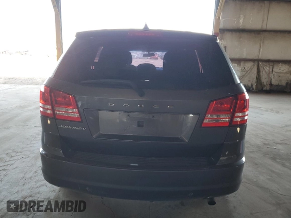 2014 Dodge Journey American Value with VIN 3C4PDCAB2ET301688, listed as a Copart auction lot 54731275 with 108,064 mi miles and Salvage Title. Bid and sale history available at DreamBid. Image 6.