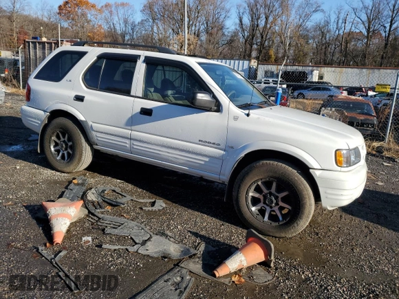 2001 Isuzu Rodeo S with VIN 4S2CK58W414338481, listed as a Copart auction lot 80849314 with 109,036 mi miles and Salvage Title. Bid and sale history available at DreamBid. Image 4.