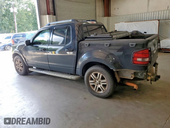 2010 Ford Explorer Sport Trac Limited с VIN 1FMEU3DE7AUA29311, выставлен на аукционе Copart как лот 65551435 с пробегом 183 700 миль миль и Списание • Salvage title. История ставок и продаж доступна на DreamBid. Изображение 2.
