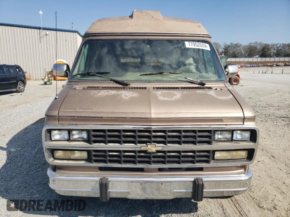 1995 Chevrolet Chevy Van z VIN 1GBEG25K9SF175004, wystawiony jako Copart lot #77952694 z przebiegiem 217 649 mil mil oraz Szkoda całkowita • Salvage title. Historia ofert i sprzedaży dostępna na DreamBid. Obrazek 5.