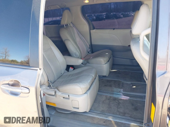 2012 Toyota Sienna XLE with VIN 5TDDK3DC5CS047530, listed as a IAAI auction lot 41780049 with 209,812 mi miles. Bid and sale history available at carsss.com. Image 8.