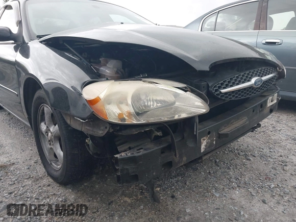 2003 Ford Taurus SES Standard with VIN 1FAFP55223A152802, listed as a IAAI auction lot 42390857 with 141,673 mi miles and . Bid and sale history available at DreamBid. Image 14.