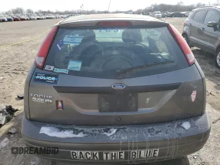 2007 Ford Focus S with VIN 1FAFP31N77W107271, listed as a Copart auction lot 42599705 with 175,692 mi miles and Clean Title. Bid and sale history available at DreamBid. Image 6.