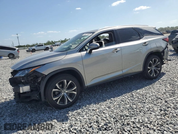 2018 Lexus RX 450hL Premium with VIN JTJDGKCAXJ2004427, listed as a Copart auction lot 55213625 with 94,557 mi miles and Salvage title. Bid and sale history available at DreamBid. Image 1.