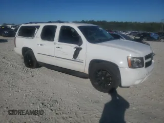 2014 Chevrolet Suburban LTZ with VIN 1GNSCKE02ER105377, listed as a Copart auction lot 76697154 with 229,461 mi miles and Salvage title. Bid and sale history available at DreamBid. Image 6.