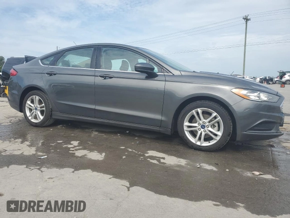 2018 Ford Fusion SE с VIN 3FA6P0HD3JR231639, выставлен на аукционе Copart как лот 59798395 с пробегом 121 368 миль миль и Списание • Salvage title. История ставок и продаж доступна на DreamBid. Изображение 4.