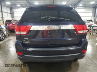2011 Jeep Grand Cherokee Laredo with VIN 1J4RR4GG9BC555662, listed as a Copart auction lot 52447235 with 151,695 mi miles and Salvage Title. Bid and sale history available at carsss.com. Image 6.