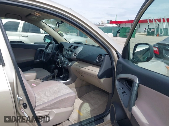 2006 Toyota RAV4 with VIN JTMZK33V365000984, listed as a IAAI auction lot 41957813 with 121,527 mi miles. Bid and sale history available at carsss.com. Image 5.